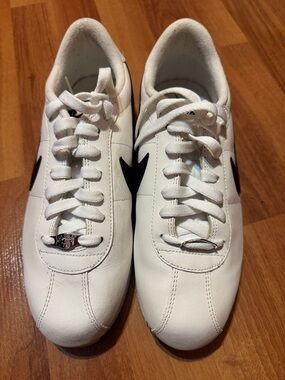 Nike White Sneakers with Black Swoosh